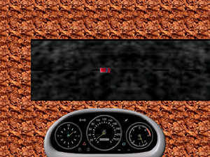 Screenshot of the gameplay. A small red car is seen from above. The car seems to be inside a tunnel (which actually is the road surrounded by walls). At the bottom of the screen is a dashboard displaying the speed meters.